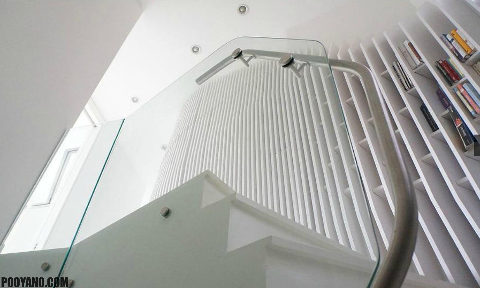بازسازی و معماری یک خانه دوپلکس با پله های مارپیچ
