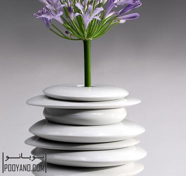 طراحی گلدان منحصربه فرد سفید رنگ برای استفاده در منزل به عنوان ویژگی تاکیدی ساده و مینیمال