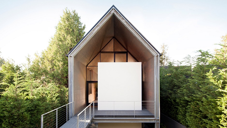 طراحی خانه اسکله ای با مناظری به دقت انتخاب شده از میان پوشش گیاهی سرسبز موجود در سیاتل